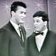 Rossi, left, with Marty Allen.